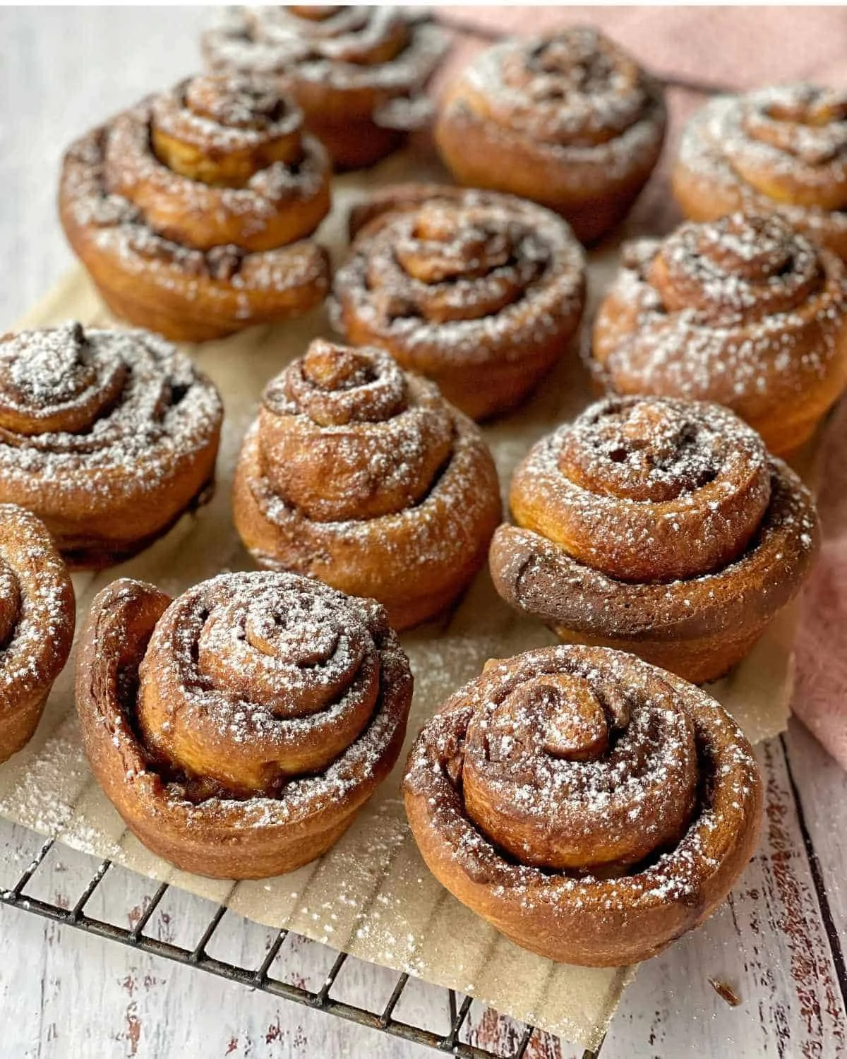 Freshly baked brioche scrolls with a rich, fluffy texture and sweet filling