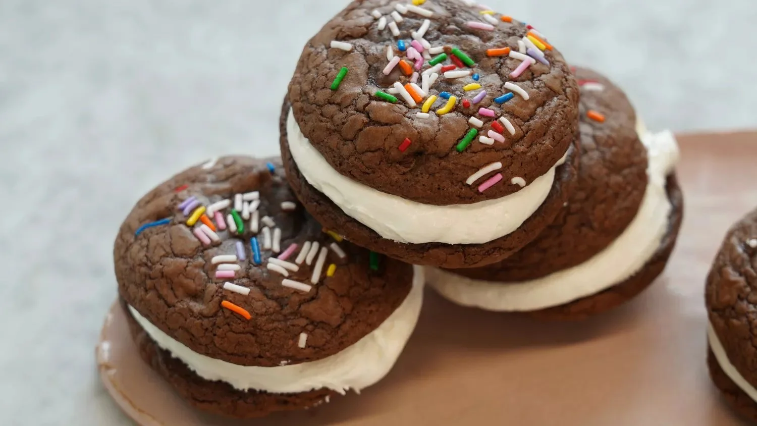 Delicious Brownie Cookie Whoopie Pies with creamy filling