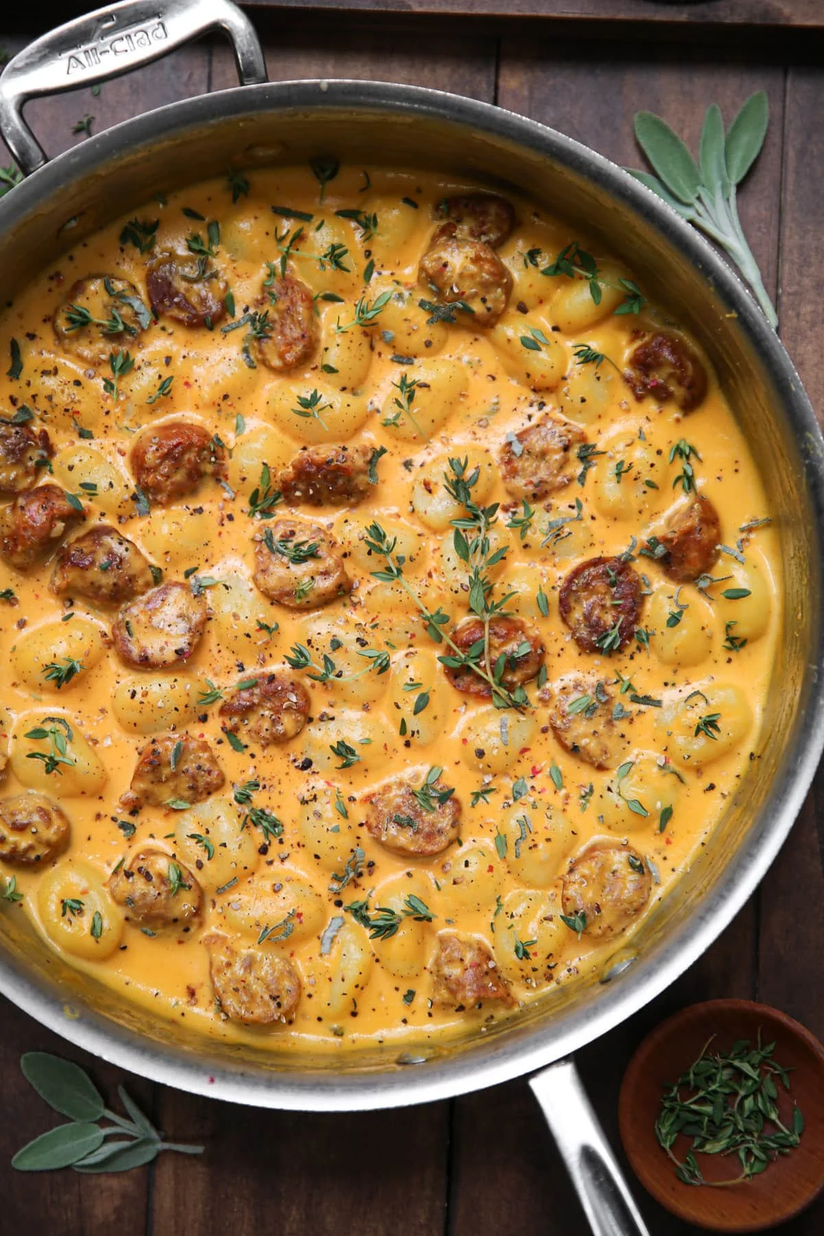 Butternut squash gnocchi with sausage served in a bowl.