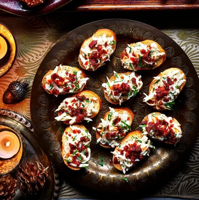 Celeriac remoulade with chorizo served in a bowl garnished with herbs