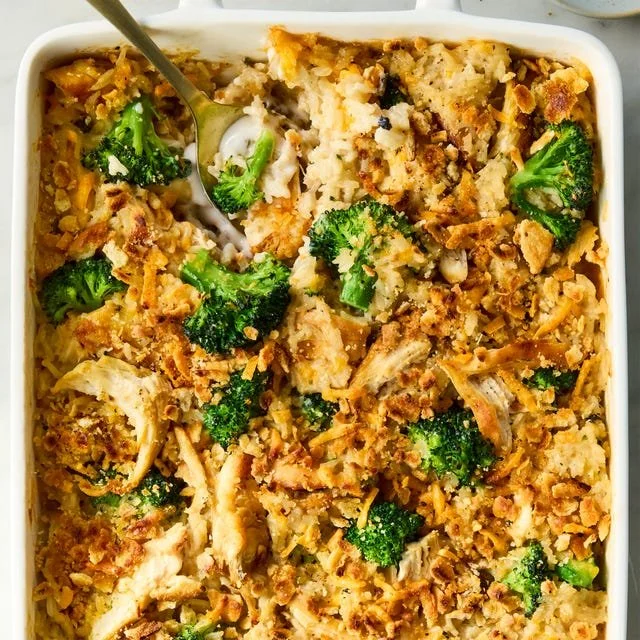 Delicious Chicken Broccoli Casserole topped with cheese and baked to perfection