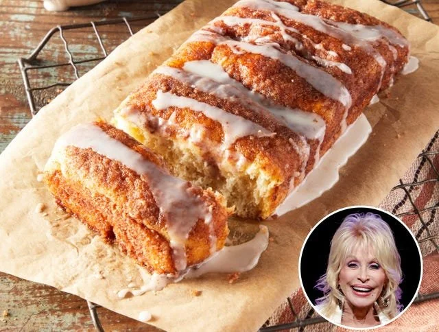 Freshly baked cinnamon bread loaf with a swirl of cinnamon and sugar.