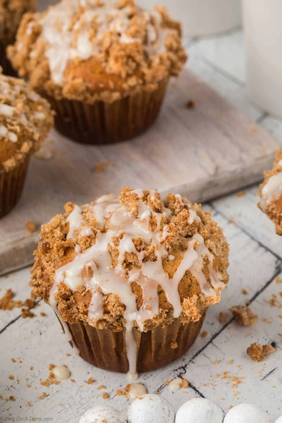 Freshly baked coffee cake muffins with a crumb topping