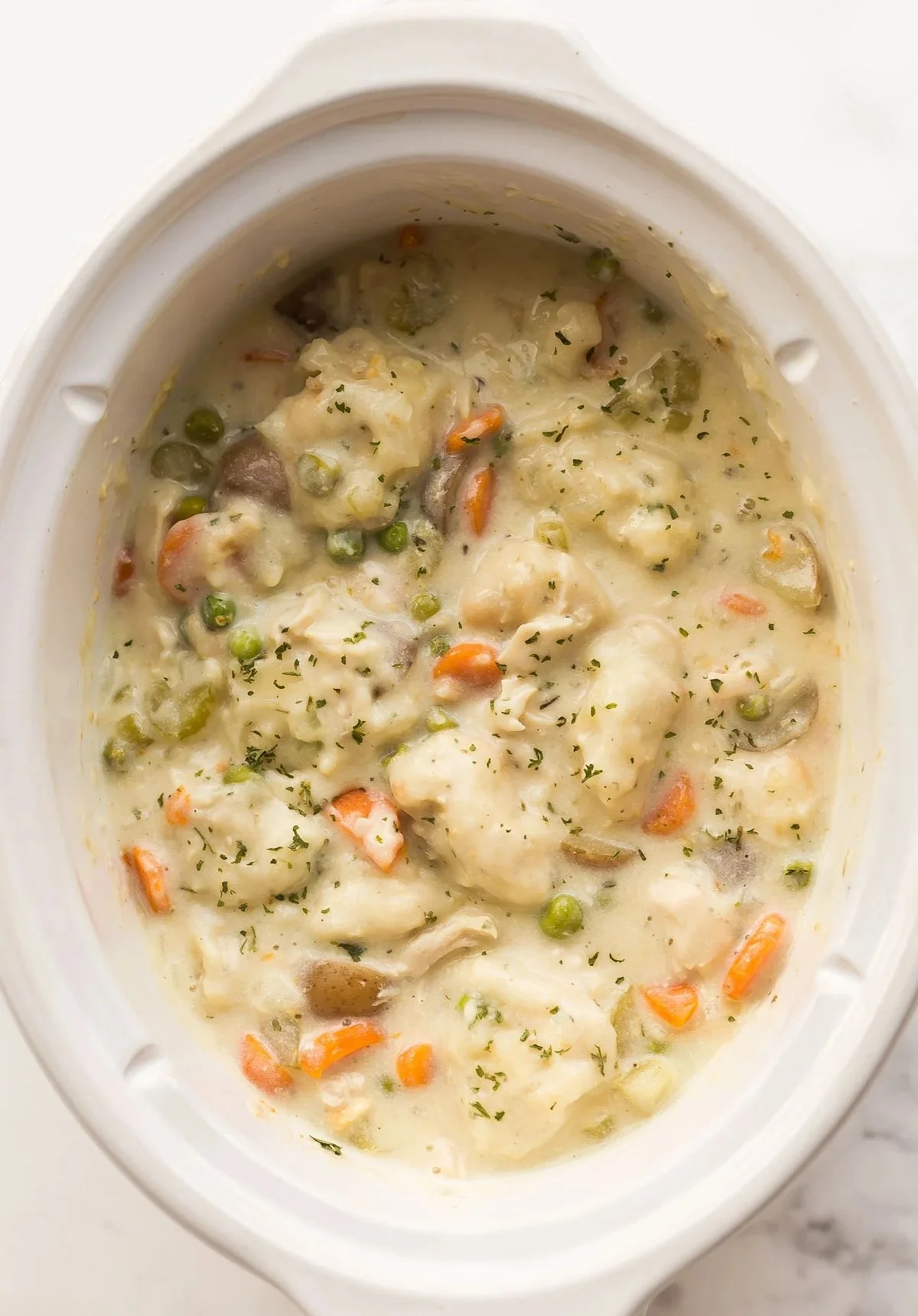 Delicious bowl of Crockpot chicken and dumplings ready to serve.
