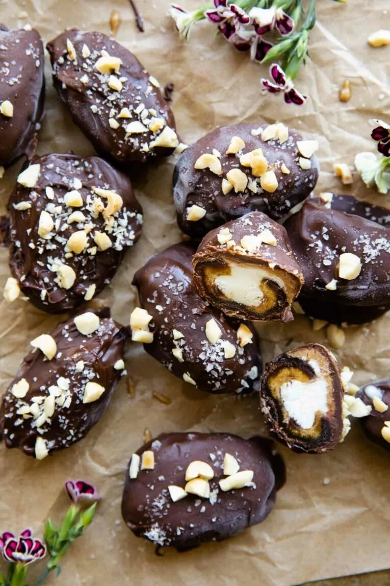 Delicious homemade Date Snickers bar with chocolate and nuts