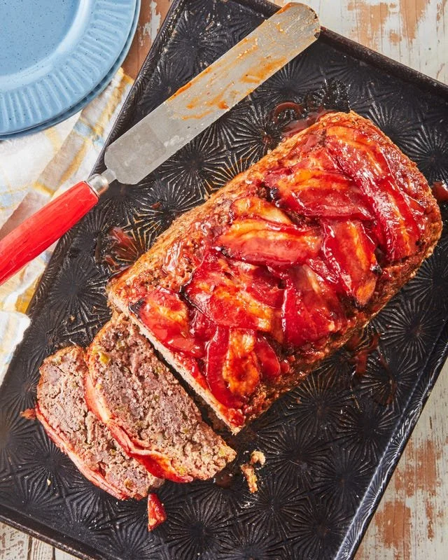 Delicious easy weeknight meatloaf served with mashed potatoes and green beans.
