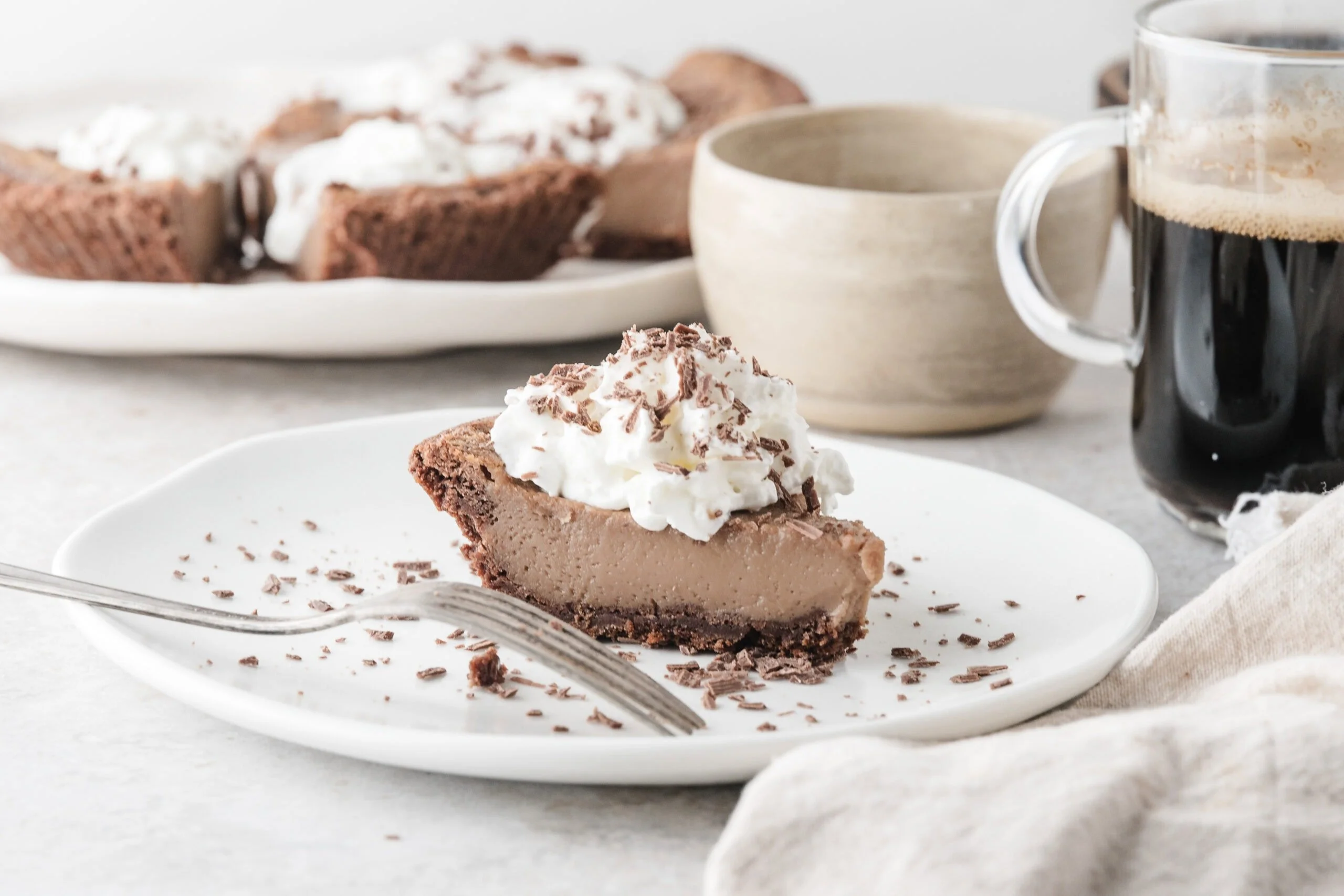Delicious homemade chocolate pie with chocolate sauce and whipped cream