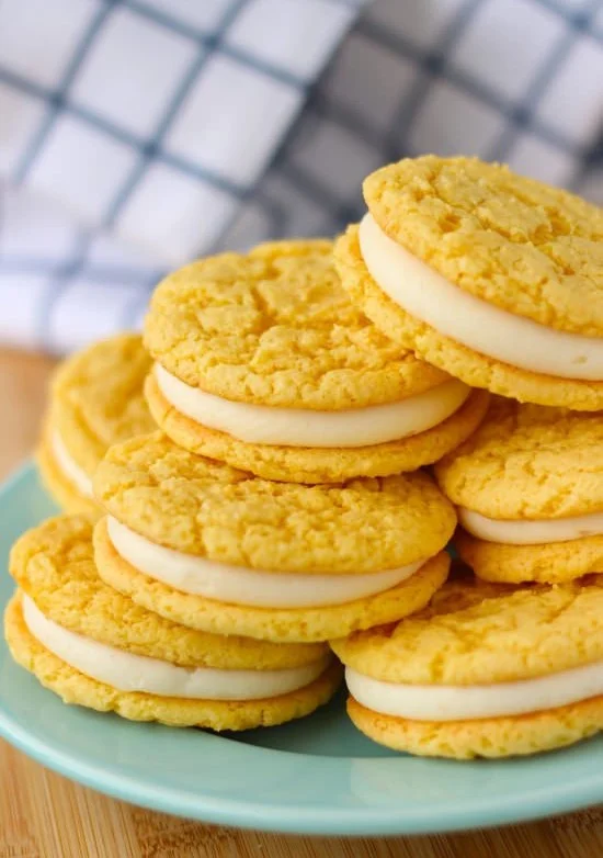 Homemade golden Oreos on a plate, freshly baked and delicious.