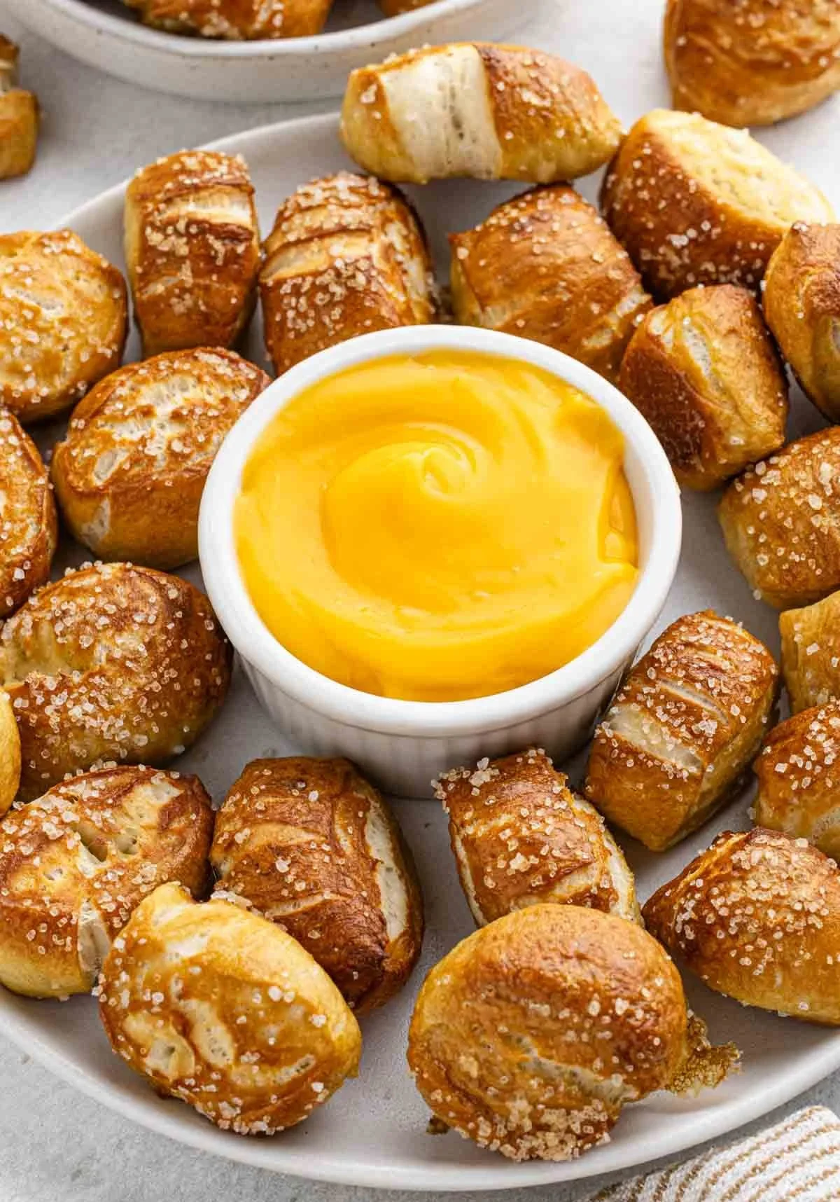 Homemade pretzel bites served with mustard for dipping