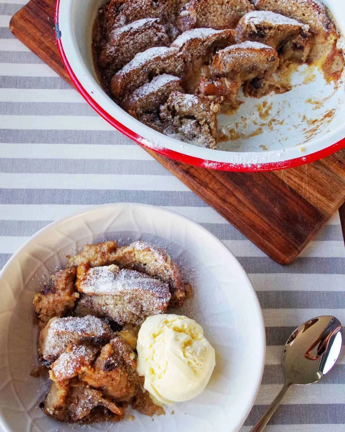 Delicious Hot Cross Bun Bread and Butter Pudding served in a cozy dish.