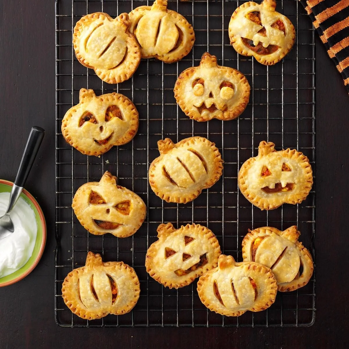 Delicious Jack-o-Lantern Empanadas shaped like pumpkins for Halloween