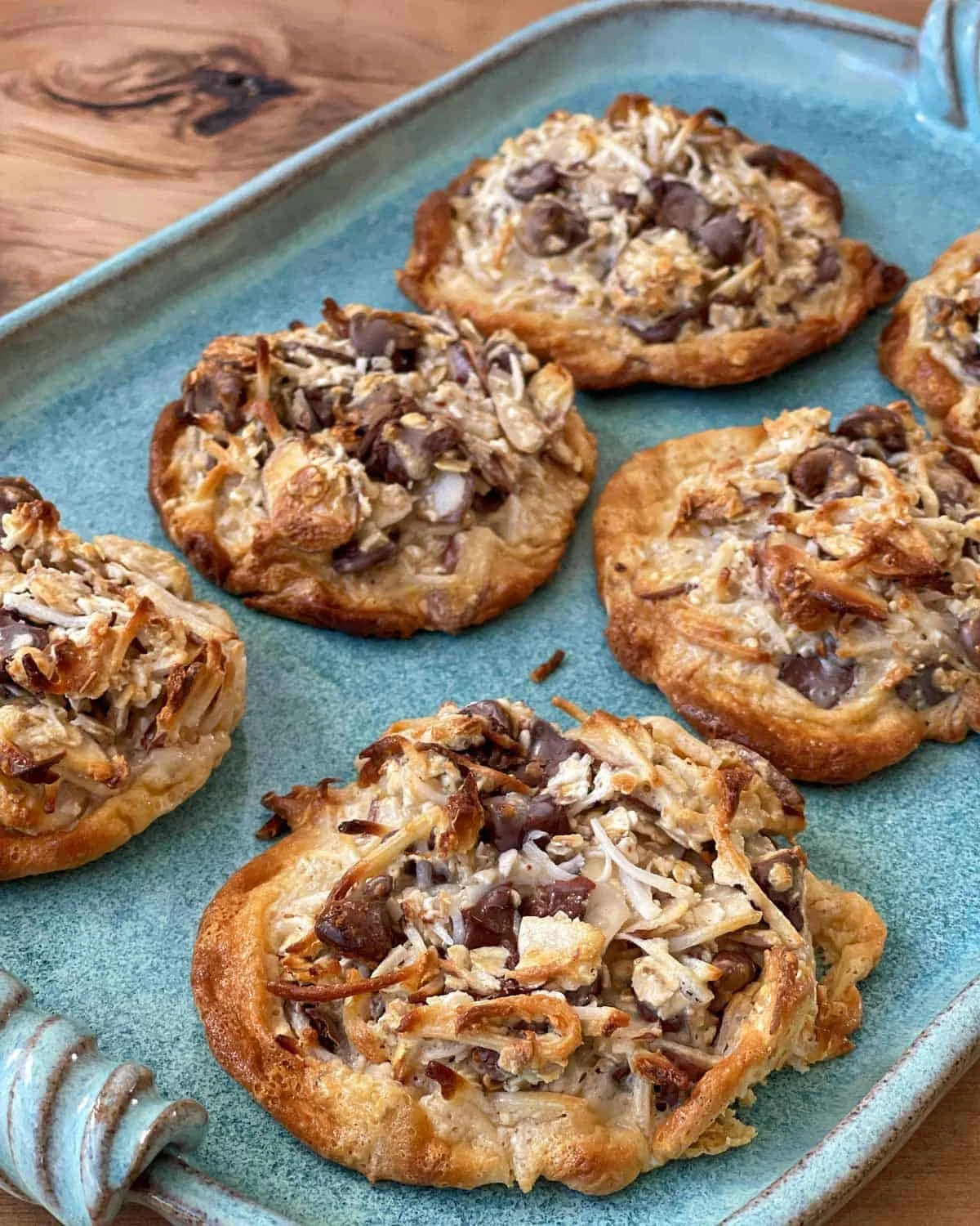 Plate of homemade Magic Cookies with chocolate chips and nuts
