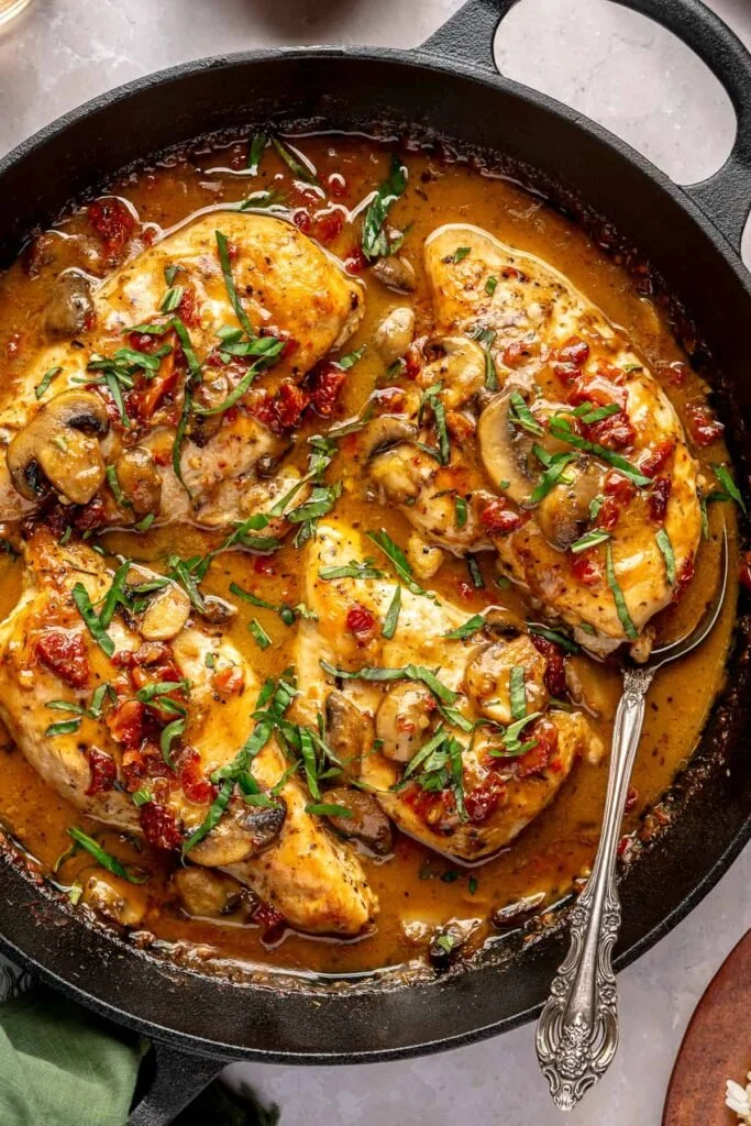 Delicious Marry Me Chicken served with creamy sauce and herbs.
