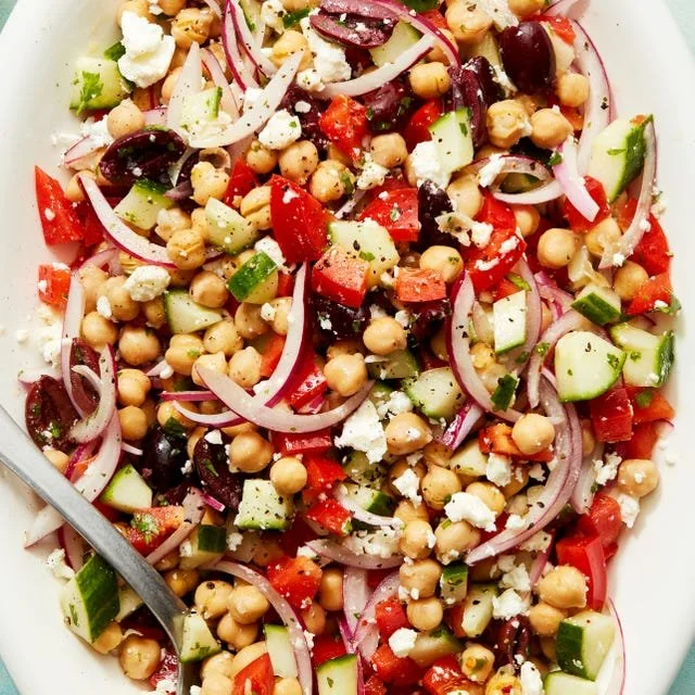 Mediterranean Chickpea Salad with colorful vegetables and herbs