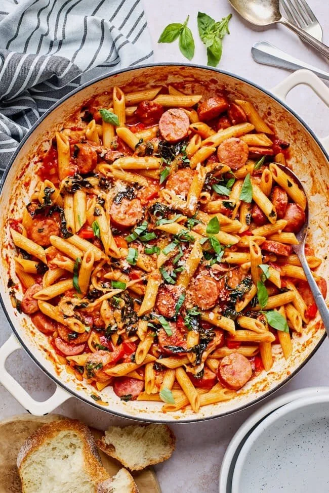 Delicious one pot sausage pasta dish with fresh herbs and spices