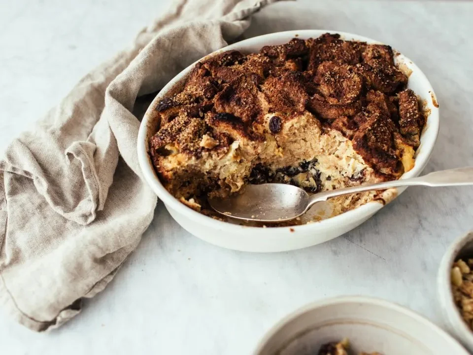 Delicious Pina Colada Bread Pudding topped with coconut and pineapple.