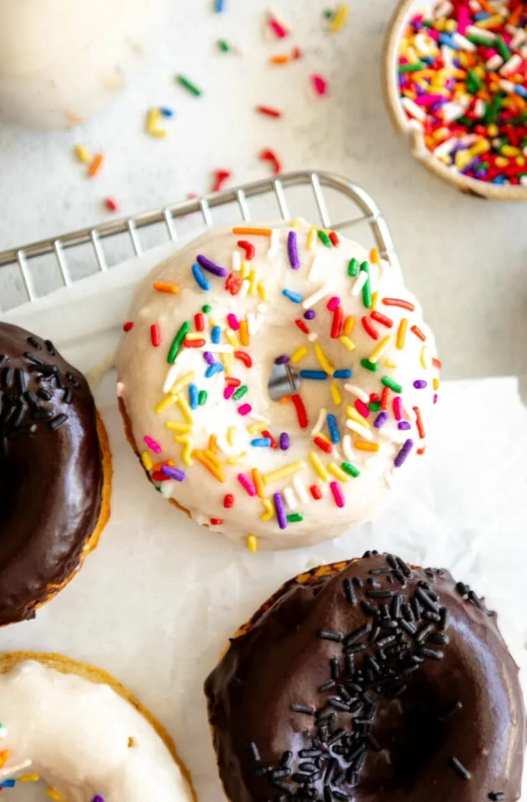 Protein donuts display with chocolate frosting and sprinkles