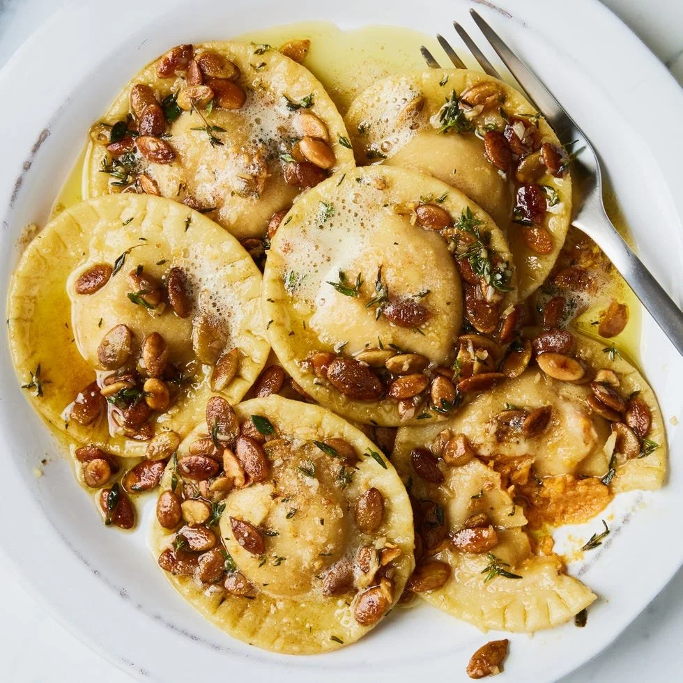 Delicious pumpkin ravioli served with sage butter sauce