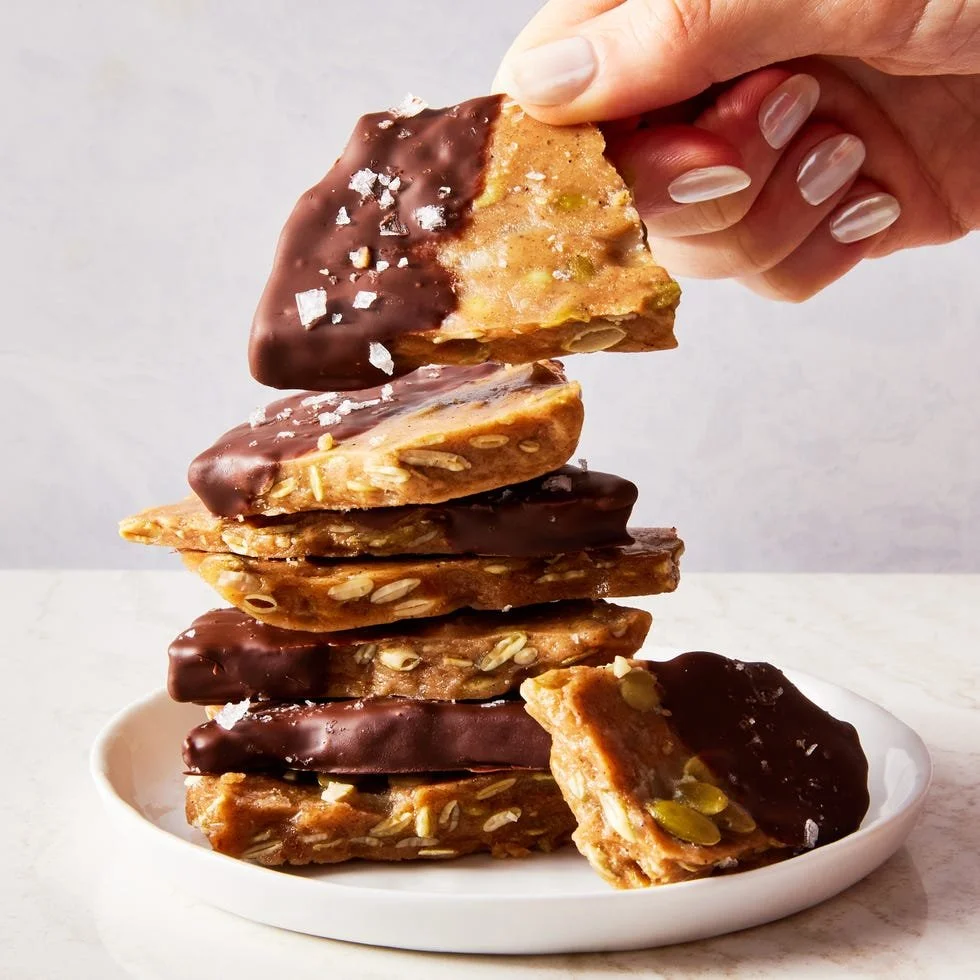 Delicious homemade pumpkin seed toffee in a decorative box