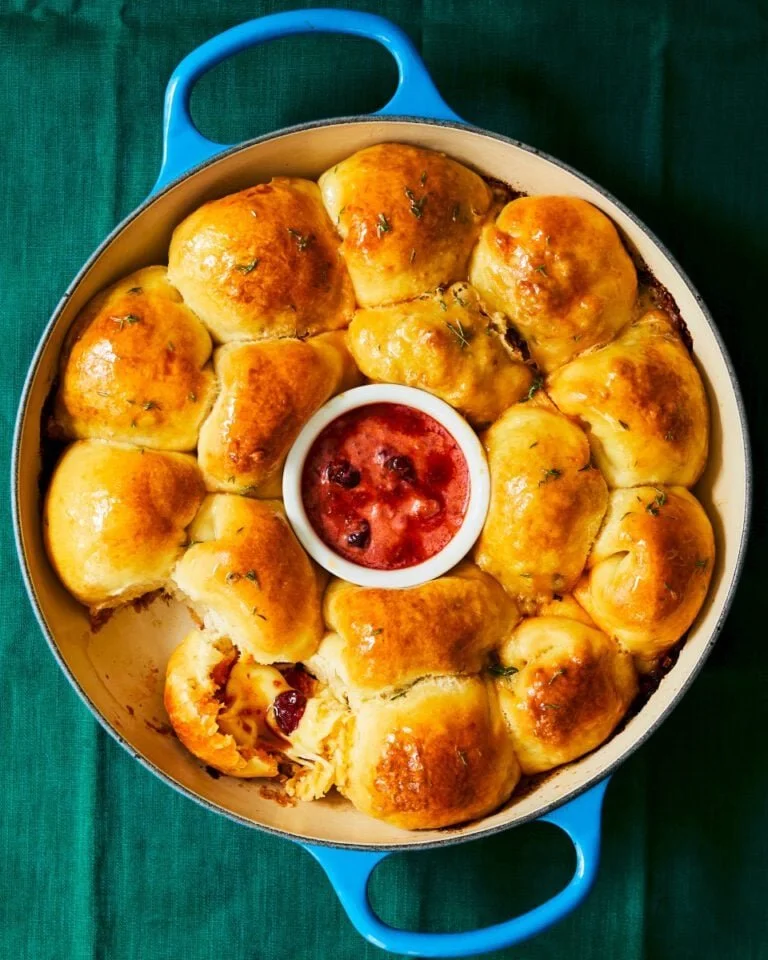 Sausage and Cheese Brioche Wreath with Nduja Cranberry Dip on a platter