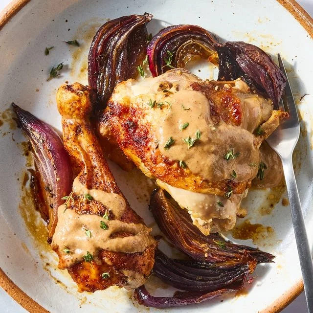 Sheet-Pan Roasted Chicken with Red Onions ready to serve