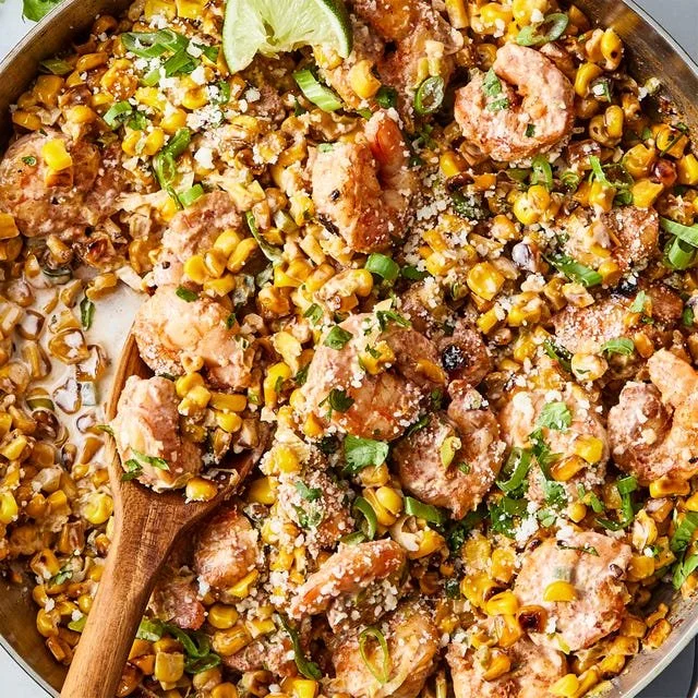 Shrimp Street Corn Skillet with vibrant corn and shrimp in a pan.