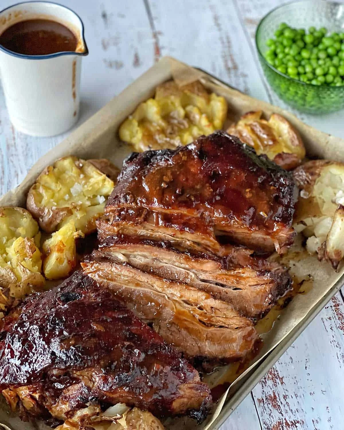 Slow-cooked beef brisket served with crispy roasted potatoes
