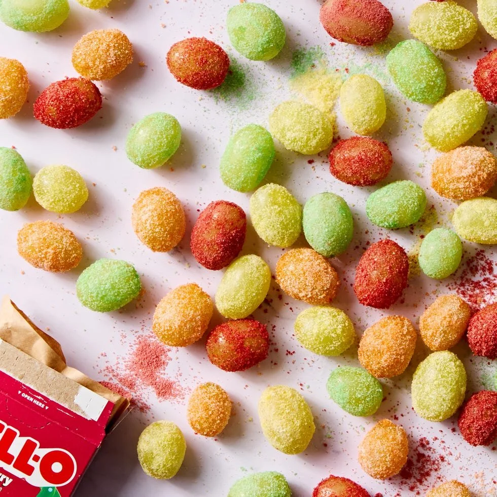 Colorful Sour Patch Grapes in a bowl, a sweet and tangy snack.