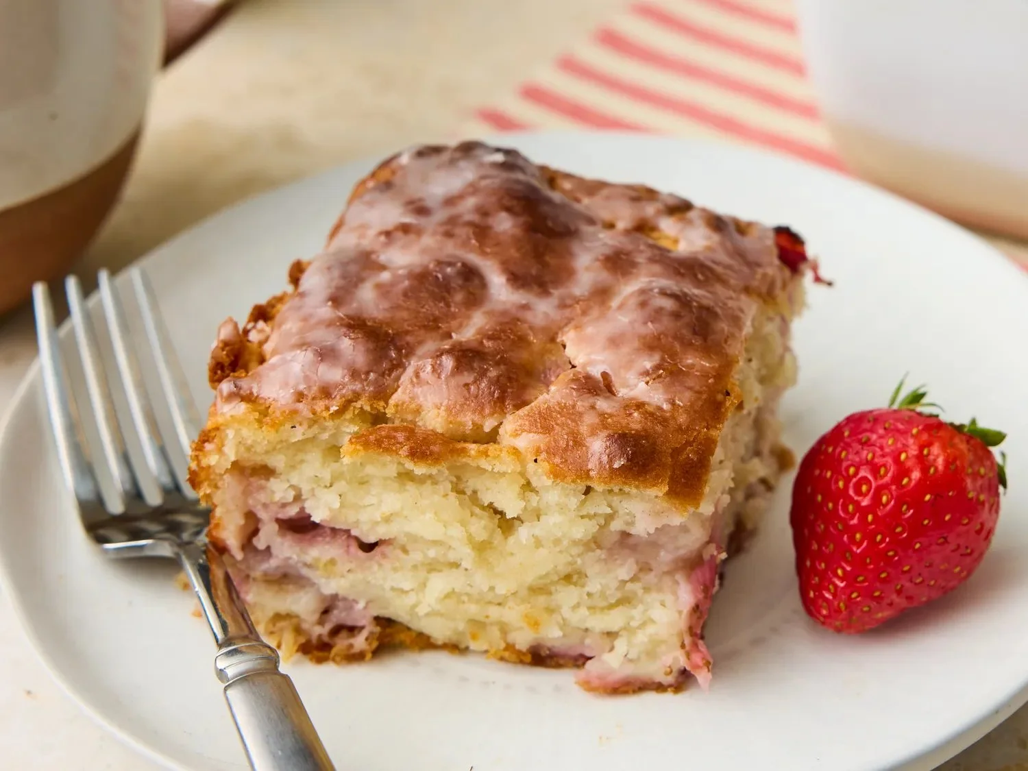 Freshly baked Strawberry Butter Swim Biscuits on a cooling rack