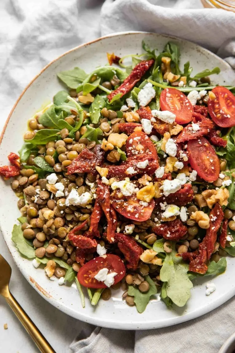 Sun-Dried Tomato and Arugula Lentil Salad with colorful vegetables