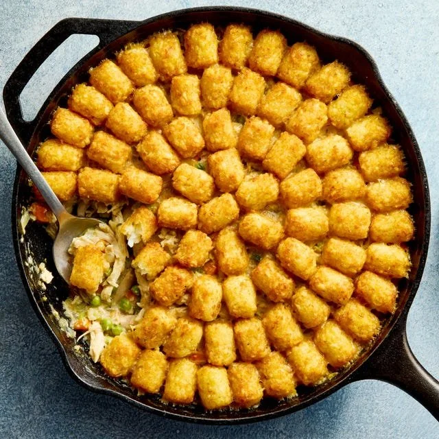 Delicious Tater Tot Chicken Pot Pie topped with crispy tater tots