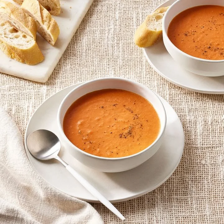 Bowl of easy soup garnished with herbs, ready to serve in under 30 minutes.