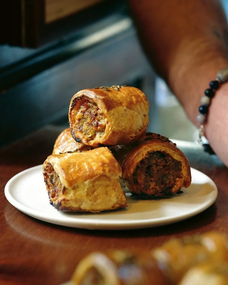 Tom Kerridge's Mini Pork Sausage Rolls with 'Nduja served as a delicious appetizer