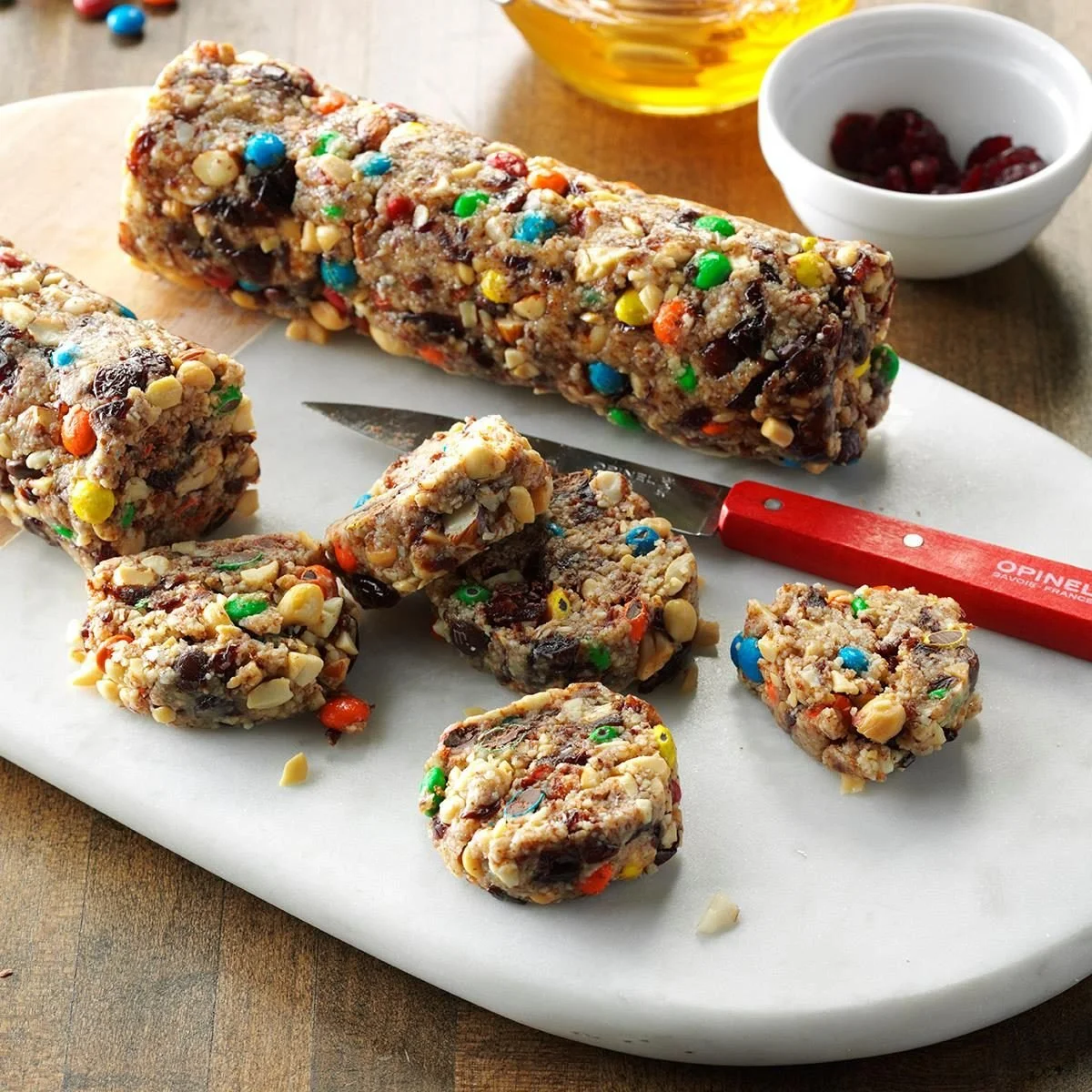 Healthy trail mix slices made with nuts and dried fruits