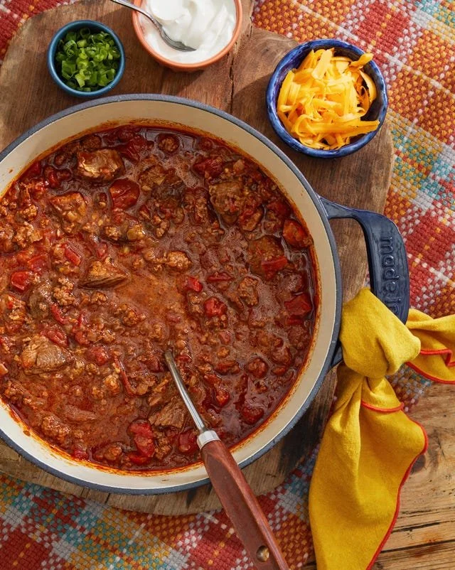 Ultimate Two-Beef Chili served in a bowl with toppings