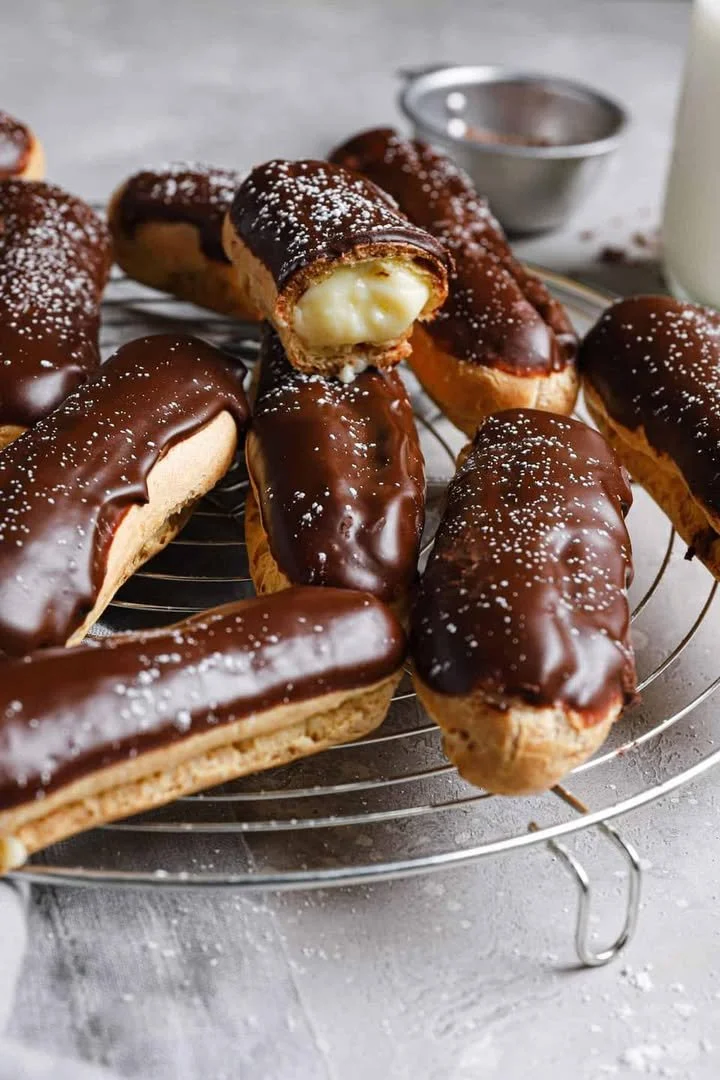 Delicious chocolate-topped eclairs filled with rich cream