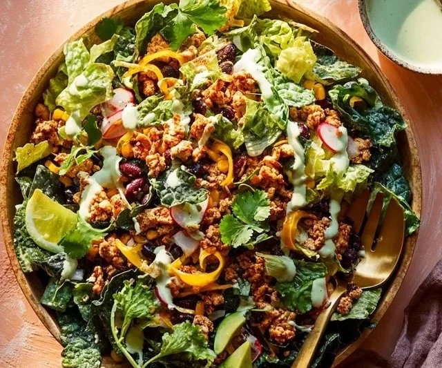Spicy turkey taco salad with fresh ingredients and vibrant colors
